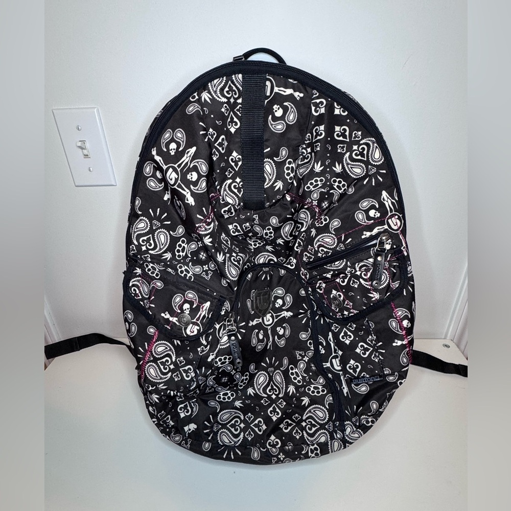 Burton Treble Yell Backpack in a black and white paisley bandana pattern